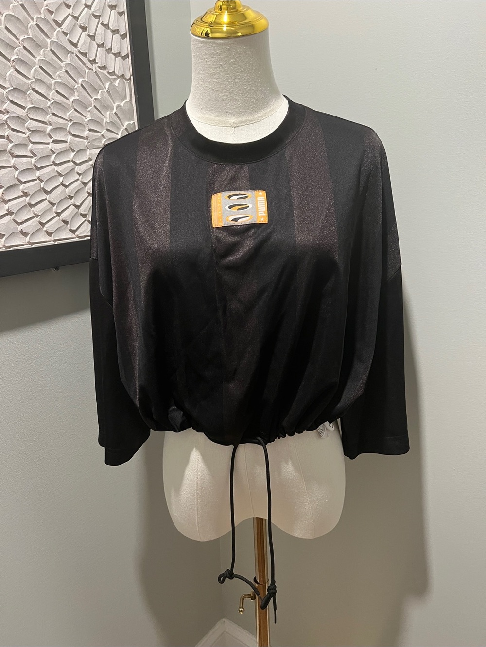 Puma Black Drawstring Cropped Sweatshirt with Orange Patch